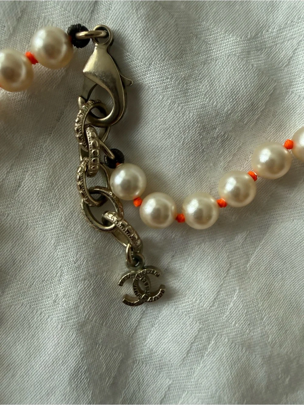 CHANEL Ivory Pearl Multi-Strand Necklace with Red Center and Crystal CC